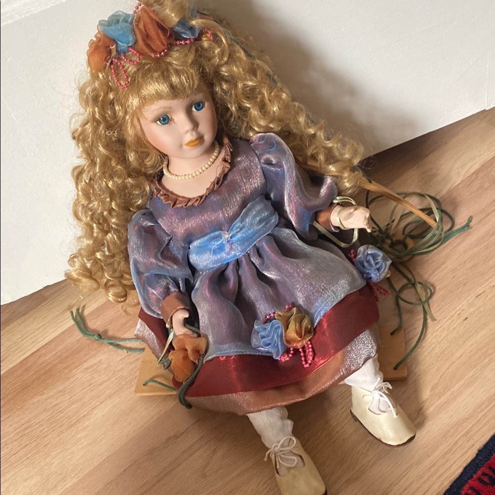 Elegant Porcelain Doll with Blue Dress